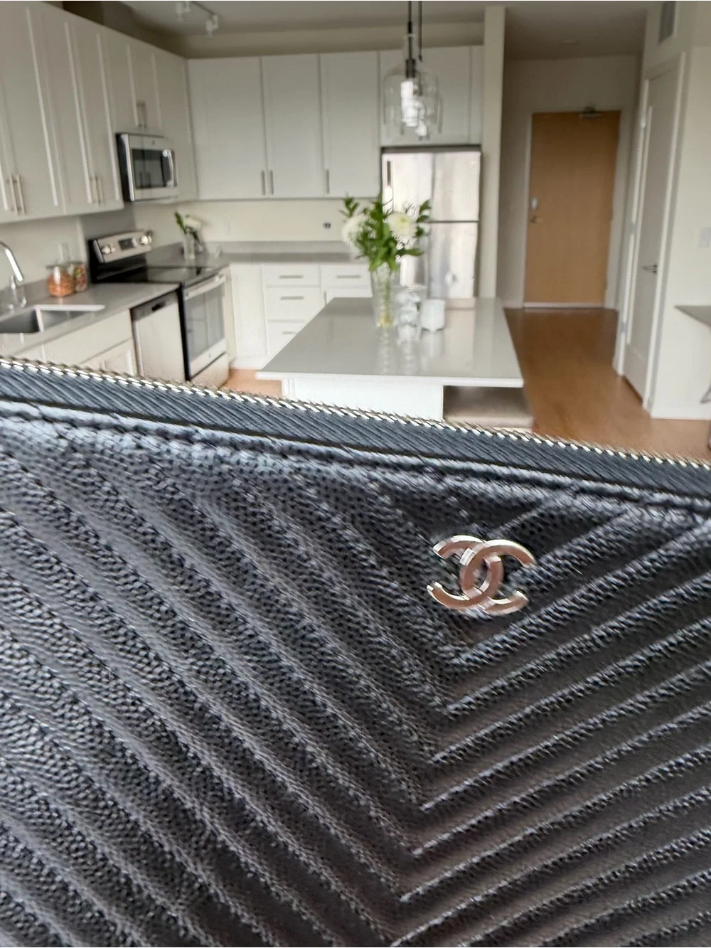 CHANEL Black Chevron Quilted Leather O Case Large with Silver CC